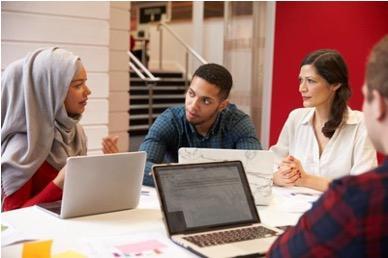 four people in a meeting